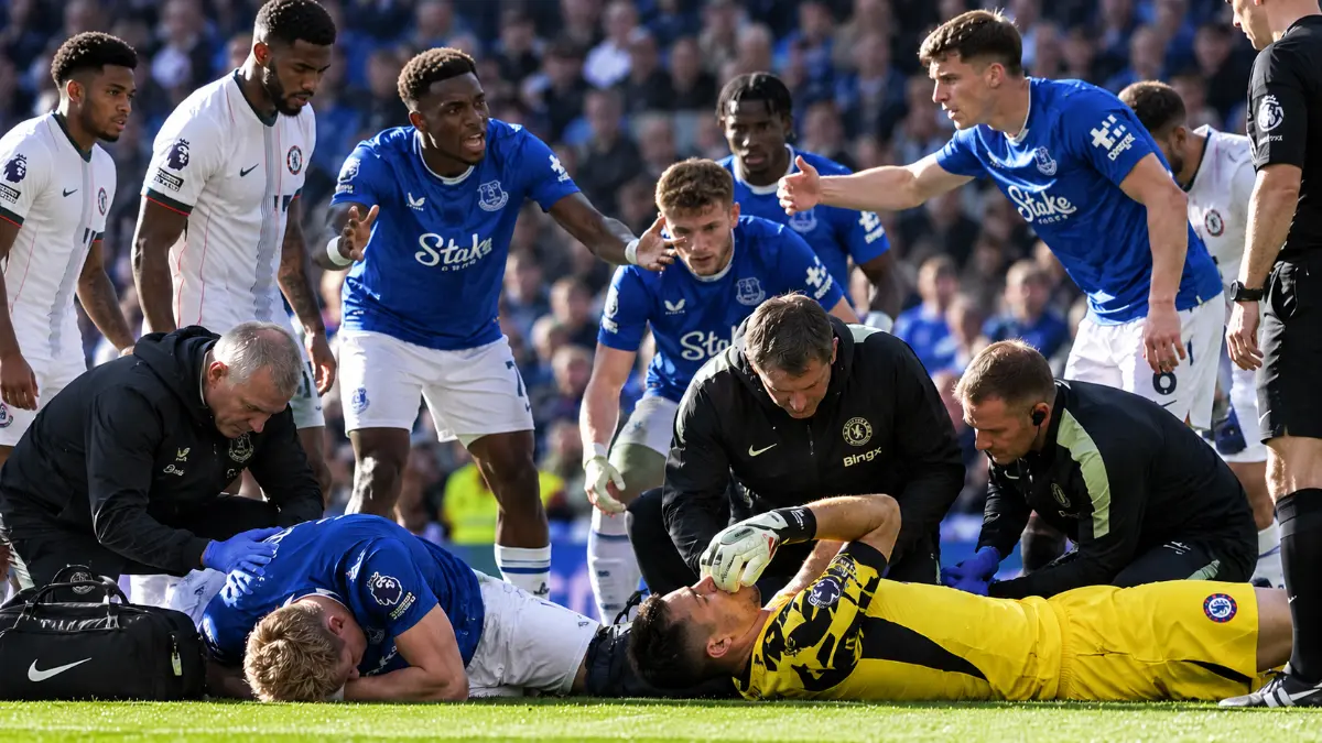 Emiliano Martinez leaves the pitch on a stretcher after head collision with Jarrad Branthwaite